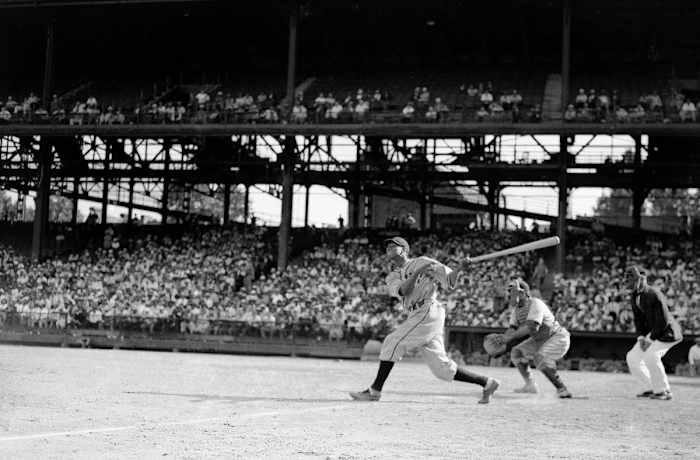CROWD-PLEASERS
If the Negro leagues lacked big league status, it was in name only: The Homestead Grays, who split time between Pittsburgh and Washington, D.C., drew huge crowds at Forbes Field (pictured, with Robert Gaston hitting in 1942) and Griffith Stadium.